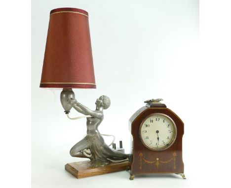 Art Deco spelter lamp base of lady holding an urn and an Edwardian mahogany inlaid small mantle clock (needs attention). (2):