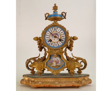 French Louis gilt on metal French Mantle clock: Decorated with Limoges type panels to face and lower central section. 35cm hi