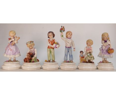 Goebel Limited Edition Child figures :  Boy with Dog 11 265 15, Boy With Present 11 262 20, Girl With Harp 11 280 20, Boy wit