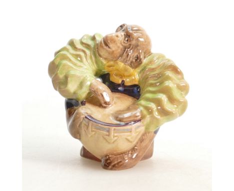 Beswick figure of a Monkey playing a drum 1255: