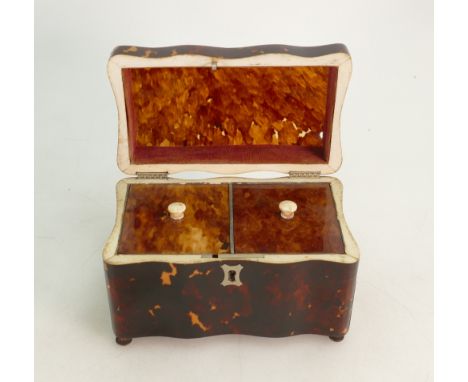 19th century Tortoiseshell Tea Caddy: Measures 14.5cm x 9cm x 9cm high.  Very small hole in top right corner of lid. 
