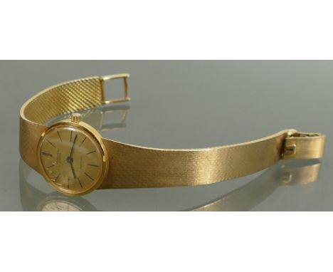 9ct gold Universal Geneve automatic ladies Watch &amp; 9ct gold bracelet: Measuring 24mm wide not including button, ticking o