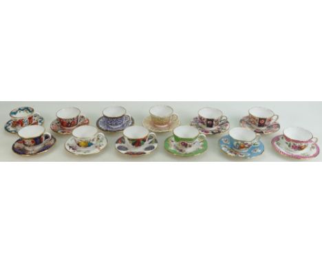 Royal Worcester set of miniature cups and saucers: Celebrating the golden age of Royal Worcester, all in various designs, lim