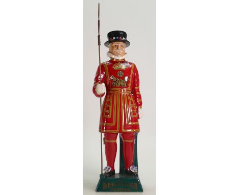 Carlton Ware ceramic Decanter in the shape of The Yeoman Beefeater: Complete with spear. Height 40cm. Condition Report: some 