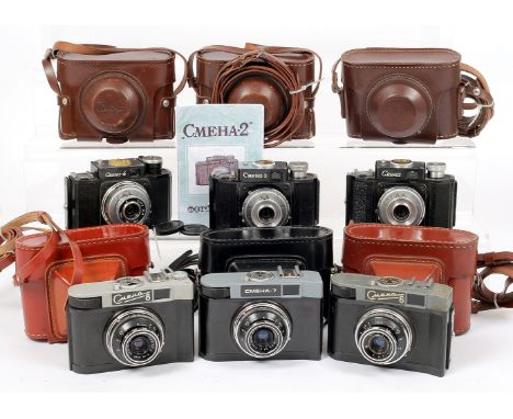 Group of Six SEMENA (Cosmic 35) Cameras. Comprising SMENA with case, SMENA-2 with cap, case & manual, SMENA-4 with cap & case