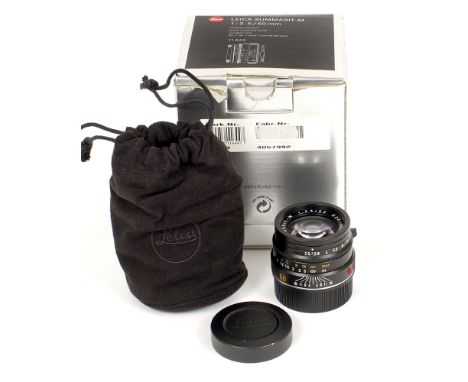 Black Leica Summarit M 50mm f2.5 Lens. E39 #4057992 (condition 5F). Small black paint mark to barrel. With caps and soft pouc