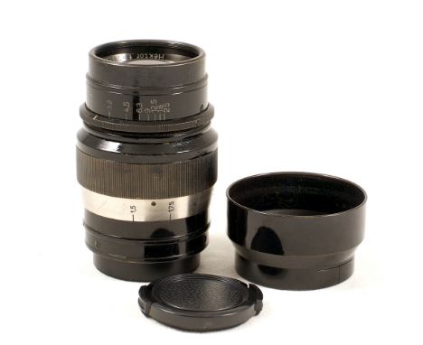 Black Leitz Hektor 7.3cm f1.9 Lens. L39 screw mount #97204 Very slight cleaning marks. (condition 5F). With original lens hoo