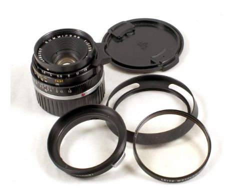 Black Summicron M 35mm f2 Lens. #2394157. (condition 4F). With Leitz Series VII Uva filter, adapter hood. With replacement ca
