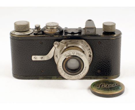 Leica 1a #36415 c1930. (condition 6F). Small dent on base plate. General wear and paint loss commensurate with age. Some play