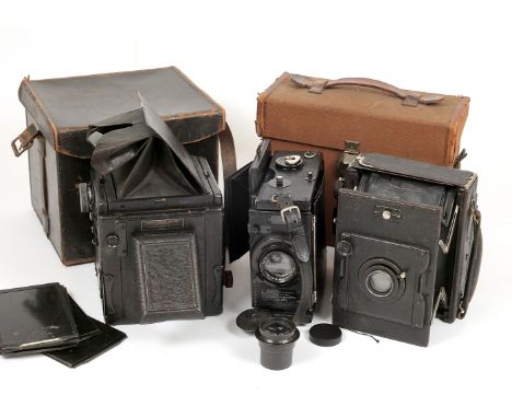 Three Folding Reflex Cameras. Comprising Ensign Special Reflex with f4.5 6? lens and spare slides, Ensign Folding Reflex Mode