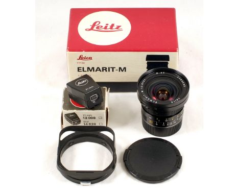 Black Elmarit M 21mm f2.8 Ultra Wide Lens. #3363433. With correct lens hood and caps in maker's box. Also correct Leitz 21mm 