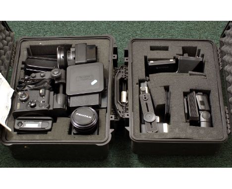 **FURTHER UPDATE**. Fuji GX680 III Professional Medium Format System. In two heavy-duty Pelicases. Comprising camera body, WL