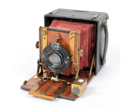 Sanderson Junior Red Bellows 5x4 Camera #4266. (condition 5F). With rise, fall and tilt lens panel, 150mm, f4.5 Isco Xenar An