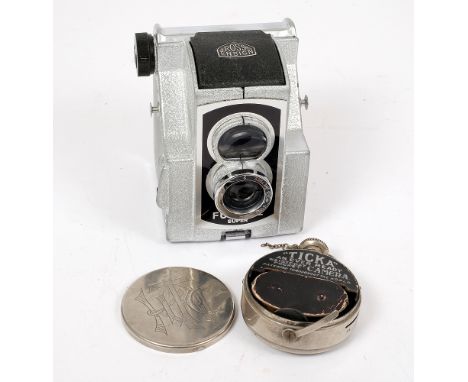 Silver Plated Ensign Ful-Vue Camera & a Houghton's Ticka. Ticka has lens cap, part of chain and original film cassette. Condi