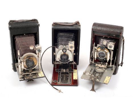 Three Uncommon Houghton Butcher, Folding Bed Cameras. Including Tudor postcard size camera with Aldis f6.3 Anastigmat lens.