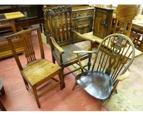 AN ERCOL STICKBACK ARMCHAIR, a vintage oak armchair and an antique oak farmhouse chair