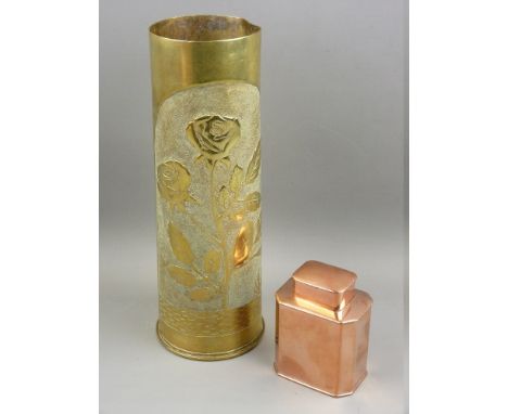 A 1943 TRENCH ART SHELL CASE and a lidded copper tea caddy, 29 and 10 cms high respectively