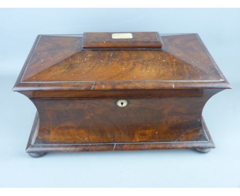 A VICTORIAN MAHOGANY WAISTED FORM SARCOPHAGUS TEA CADDY having twin interior lidded containers and central mixing bowl, 22 cm