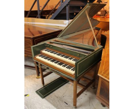 Double Manual HarpsichordA Double manual harpsichord in a green painted case on a trestle base. Please note one set of jacks 