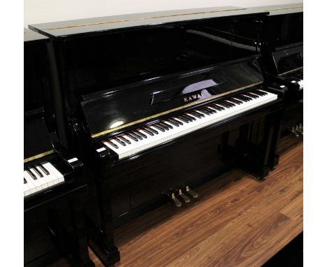Kawai (c1962) A Model K-20 upright piano in a bright ebonised case.