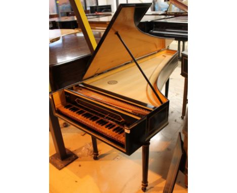 HarpsichordA modern 6ft single manual harpsichord with 8 foot and buff stops (possibly an Italian copy of a Baffo) in a black