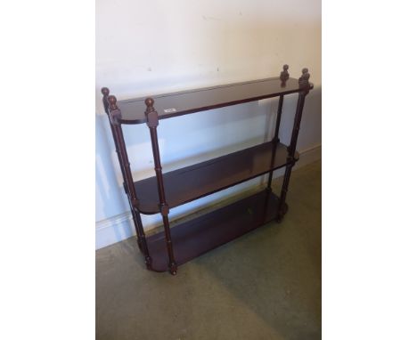 A mahogany hanging shelf, 70cm high x 78cm wide 