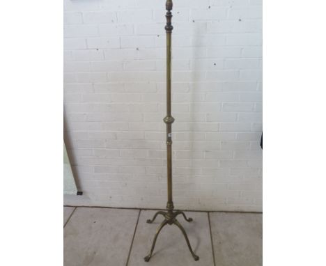 A Benson brass extending standard lamp 