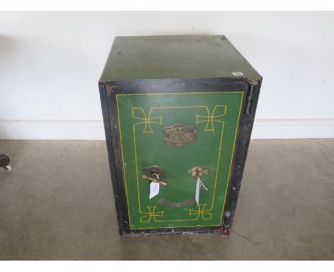 A vintage cast iron safe with a makers plaque for George Titterton of Birmingham with two internal drawers with key - 76cm hi