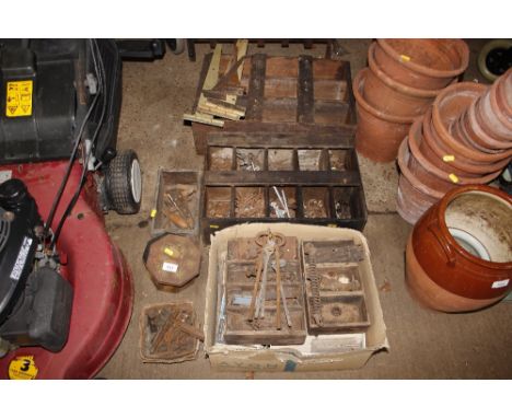 A box and two crates of various screws; fittings; hammer heads etc