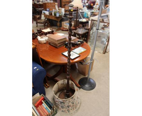 An oak barley twist standard lamp and shade