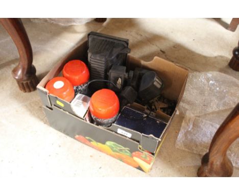 A box containing various fittings, nails, spot light etc.