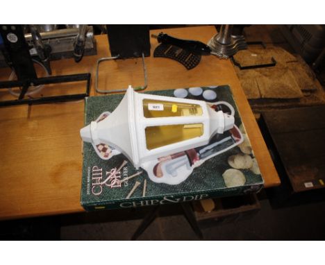 A Chip and Dip plate in the form of a golfer; and an outside light fitting