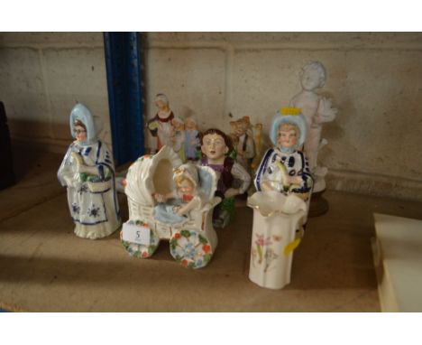 A collection of various ornaments and figures to include a Yardley soap dish, Staffordshire jug etc.