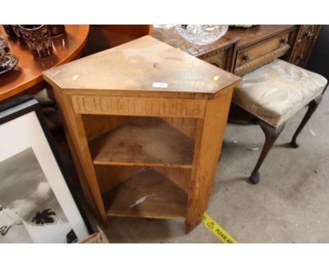 An oak corner shelf 