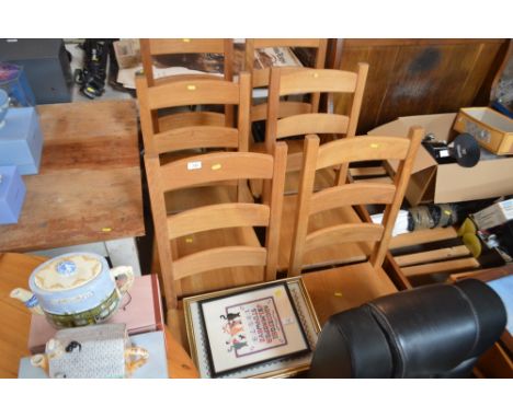 A set of six modern ladder back dining chairs