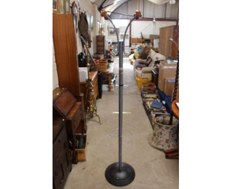 A metal hat, coat and stick stand