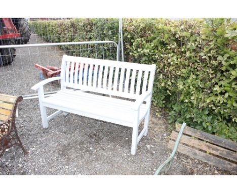 A painted wooden garden bench