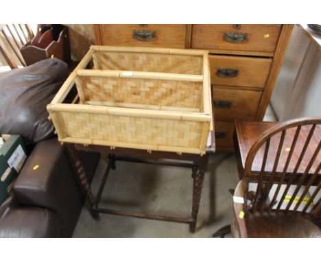 A cane wall shelf and an oak barley twist occasional table