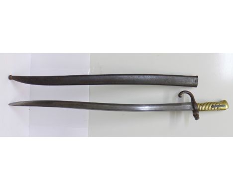 A French bayonet and scabbard, with matching numbers, 874