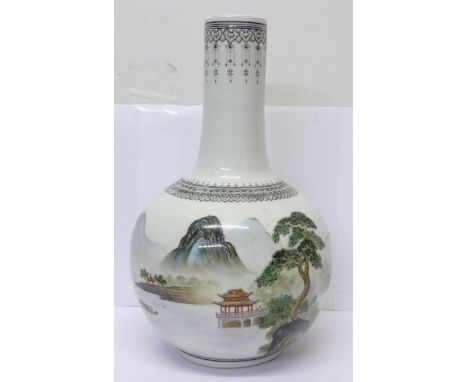 A Chinese bottle vase with landscape scene, the back with Chinese writing, height 28cm, seal mark to base