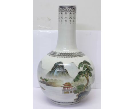 A Chinese bottle vase with landscape scene, the back with Chinese writing, height 28cm, seal mark to base