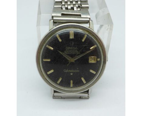 An Omega Constellation automatic chronometer wristwatch with black dial