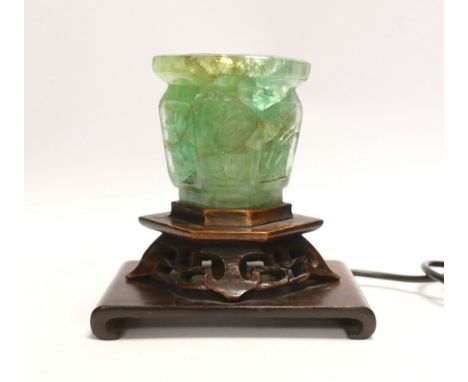 A Chinese green quartz and carved hardwood table lamp,