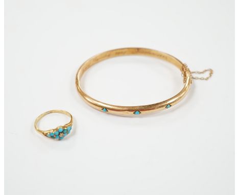 A Victorian yellow metal and three stone cabochon turquoise set hinged bangle, together with a similar yellow metal turquoise