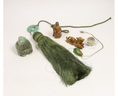 Six Chinese items including a carved jade fish pendant, a jade ring, a bowenite jade figure, an agate carved dragon, an earth