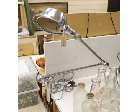 An Industrial style Anglepoise clamp lamp