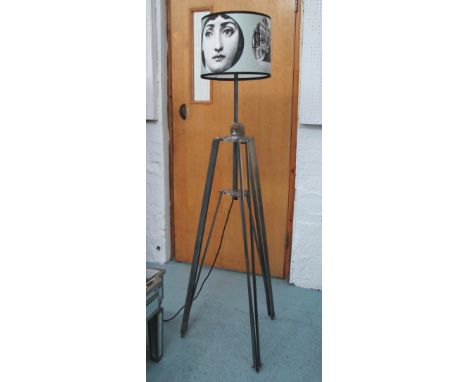 STANDARD LAMP, in steel on extendable tripod supports with Fornasetti style shade, 151cm H. 