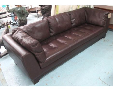 ROCHE BOBOIS SOFA, in brown leather, 89cm x 78cm H x 246cm.