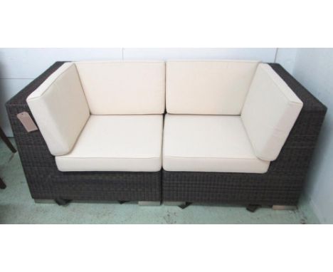 INDIAN OCEAN SOFA, in all weather viro weave with loose cream cushions, 182cm x 90cm x 76cm H. (in two sections)