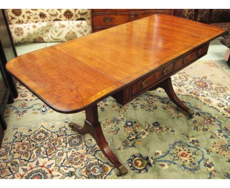 SOFA TABLE, Regency mahogany with rosewood crossbanding and two small drawers below and two false to the reverse having drop 